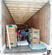 Dean, Andy, and Logan finishing the packing