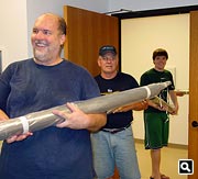 Parishioners carrying front pipes