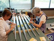 Church members gilding pipe mouths
